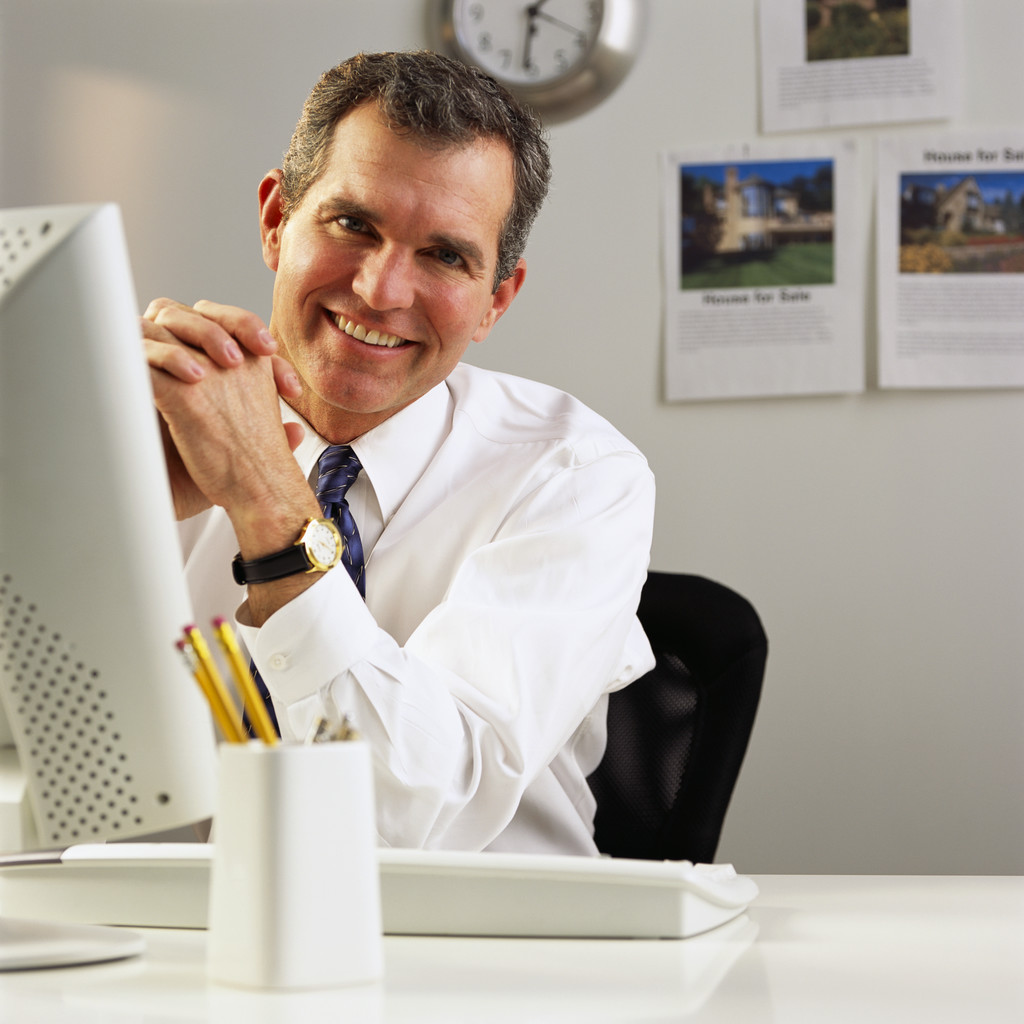 Businessman Sitting at His Desk